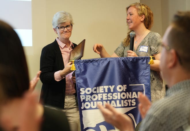 April 17, 2024; Columbus, Ohio, USA; Laura Bischoff accepts the First Amendment award at the 2024 Society of Professional Journalists Central Ohio Chapter annual Founders Day ceremony. Bischoff is a reporter for the USA TODAY Network Ohio Bureau, which serves the Columbus Dispatch, Cincinnati Enquirer, Akron Beacon Journal and 18 other affiliated news organizations across Ohio. She was part of a Gannett team of reporters and photographers that launched an eight-month investigation into Ohio's youth prisons and juvenile detention centers and found they're overwhelmed by violence, trauma and staff shortages. The SPJ event was held at the Columbus Center for Architecture and Design, 50 W. Town St.