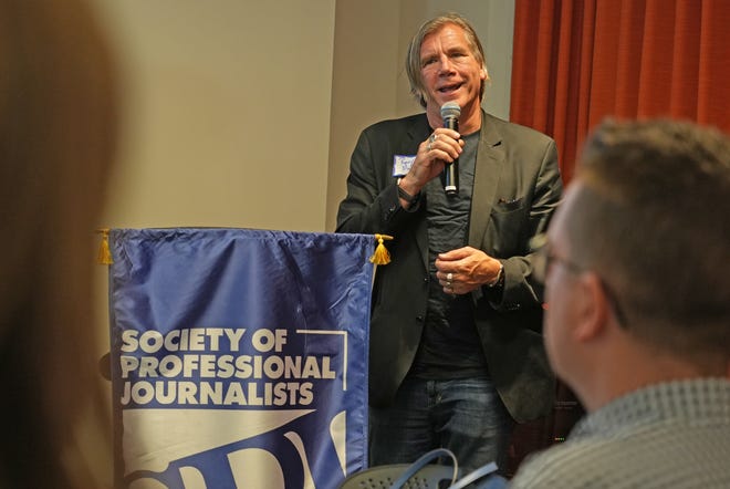 April 17, 2024; Columbus, Ohio, USA; Randy Malloy of WWCD speaks after accepting an appreciation award at the 2024 Society of Professional Journalists Central Ohio Chapter annual Founders Day ceremony. The event was held at the Columbus Center for Architecture and Design, 50 W. Town St.