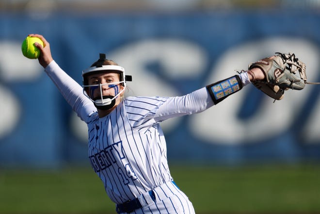 Apr 22, 2024; Powell, Ohio, USA; Olentangy Liberty's Emily Chevalier (14) pitches during the high school softball game against Hilliard Bradley at Olentangy Liberty High School. Hilliard Bradley won 3-2. Mandatory Credit: Graham Stokes-The Columbus Dispatch