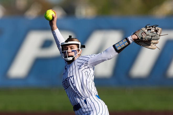 Apr 22, 2024; Powell, Ohio, USA; Olentangy Liberty's Emily Chevalier (14) makes a pitch during the high school softball game against Hilliard Bradley at Olentangy Liberty High School. Hilliard Bradley won 3-2. Mandatory Credit: Graham Stokes-The Columbus Dispatch