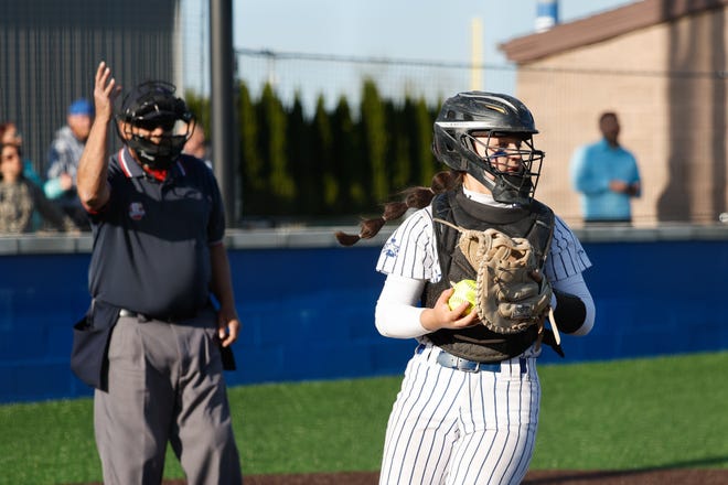 Apr 22, 2024; Powell, Ohio, USA; Olentangy Liberty's Haley Colegrove (24) makes a catch on a foul ball during the high school softball game against Hilliard Bradley at Olentangy Liberty High School. Hilliard Bradley won 3-2. Mandatory Credit: Graham Stokes-The Columbus Dispatch