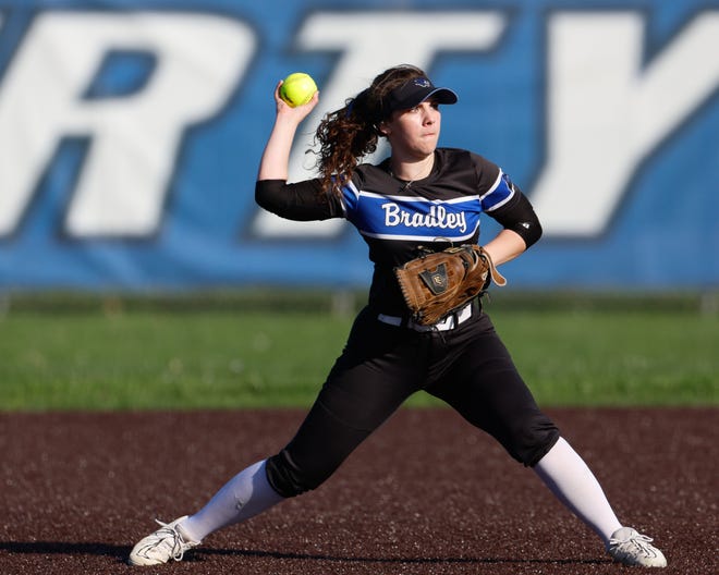 Apr 22, 2024; Powell, Ohio, USA; Hilliard Bradley's Cora Moine (4) throws to first during the high school softball game at Olentangy Liberty High School. Hilliard Bradley won 3-2. Mandatory Credit: Graham Stokes-The Columbus Dispatch