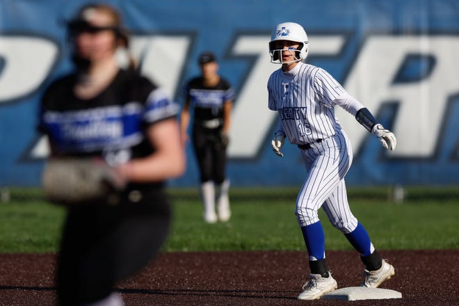 Apr 22, 2024; Powell, Ohio, USA; Olentangy Liberty's Allie Jenkins (16) prepares to attempt to steal third base during the high school softball game against Hilliard Bradley at Olentangy Liberty High School. Hilliard Bradley won 3-2. Mandatory Credit: Graham Stokes-The Columbus Dispatch