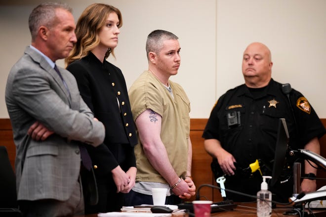 Dallas Lowery, center right, at his sentencing Thursday in front of Franklin County Common Pleas Judge Jeffrey Brown after being found guilty in March of murder in the fatal shooting of his ex-girlfriend and his infant child's mother, Heather Chapman. Standing beside Lowery at left are his attorneys, Jeremy Dodgion and Alexis Dodge.